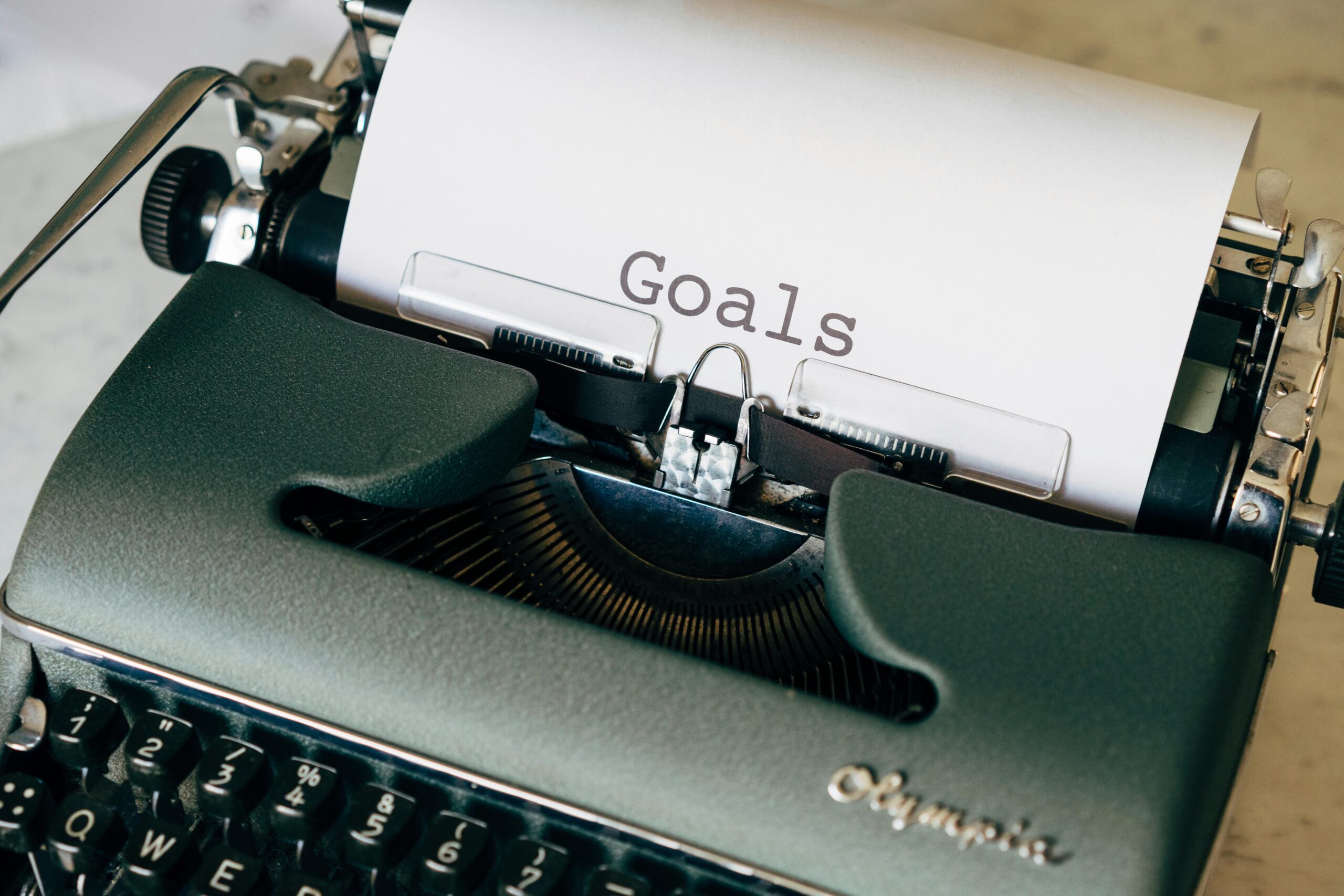 Typewriter with "goals" written on paper